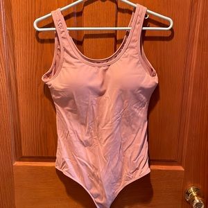 Klassy network tank top bodysuit.